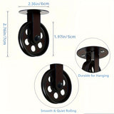 Un conjunto de 2 poleas negras de 2 pulgadas, 2 para luces de araña, diseñadas para poleas de pared vintage para luces de crecimiento de plantas en un gazebo industrial rústico.