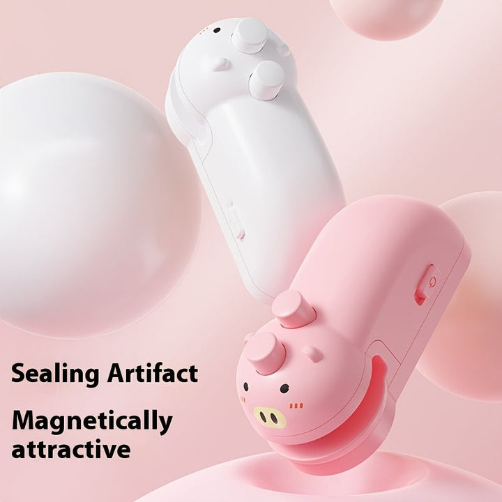 Mini máquina selladora de cerdito linda, adhesivo magnético para bolsas de refrigerador, sellado manual portátil doméstico con atracción magnética para evitar fugas de aire y humedad