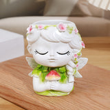 1pc Decoración de Jarrón de Resina con Ángel - Adorno Clásico para el Hogar con Hojas Verdes y Flores Rosas, Diseño Artesanal en Base para Sala de Estar, Dormitorio u Oficina, Decoración de Ángeles, Arte Detallado