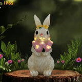 Escultura de Conejo Solar con Luz - Impermeable, Artesanía de Resina con Corona de Flores Rosas para Jardín, Patio y Decoración de Césped - Ideal para el Día de la Madre, Navidad, Acción de Gracias, Regalos de Pascua, Accesorios de Conejo