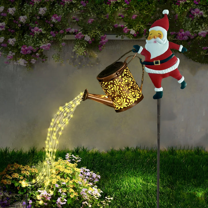Linternas solares para jardín al aire libre, luces colgantes solares en forma de tetera, Papá Noel lleva una tetera Lámpara de riego con luz fluída de alta luminosidad, Adecuado para jardín, césped, patio, luces navideñas de decoración festiva
