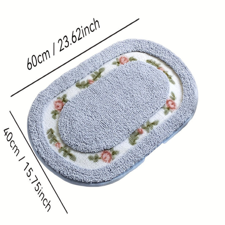 Una alfombra ovalada en la entrada, una alfombra junto a la cama cerca de la ventana salediza, una alfombra antideslizante para el baño y una alfombra absorbente para el cuarto de baño.